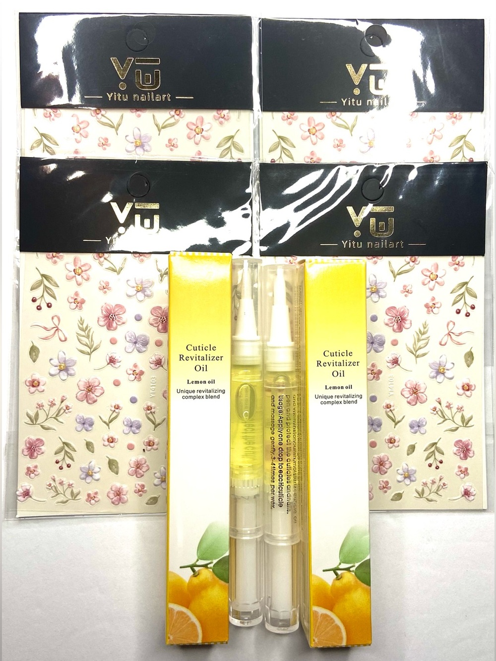 2 nail cuticle oil and 4 nail stickers
